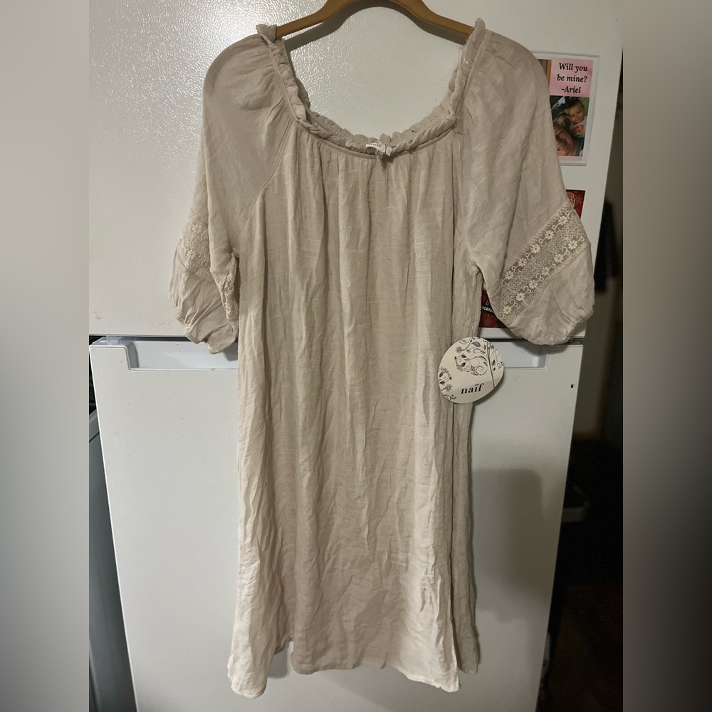 Naïf Cream Dress With Lace On Sleeve Has Something On It Need To‎ Clean